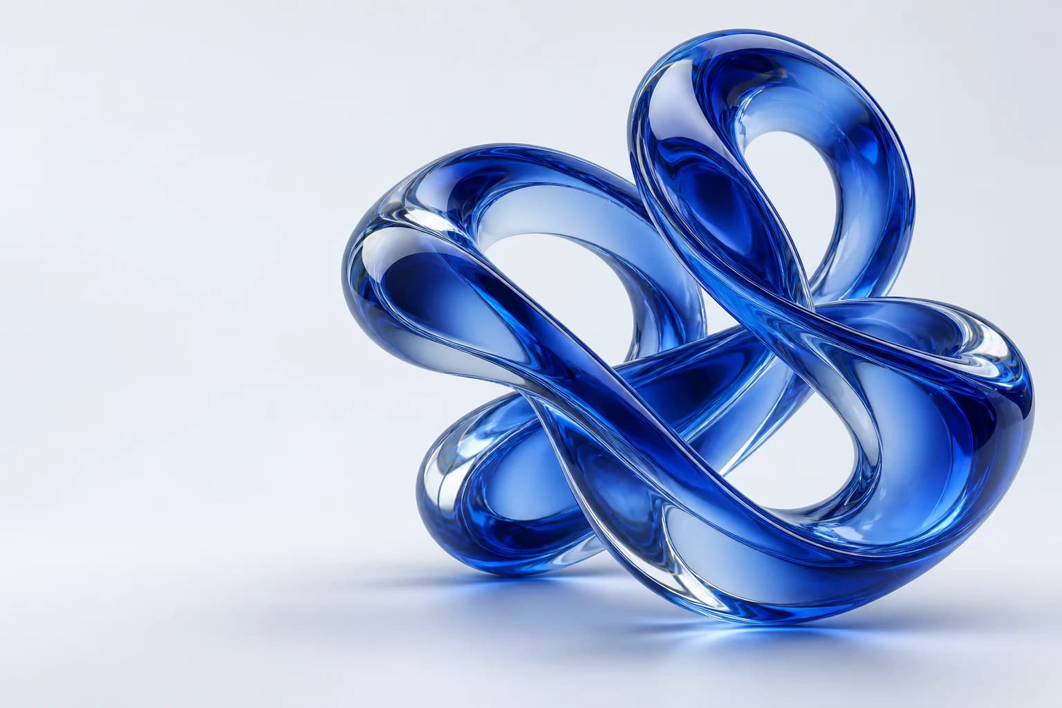 Flowing cobalt glass loops, connected into one coordinated form